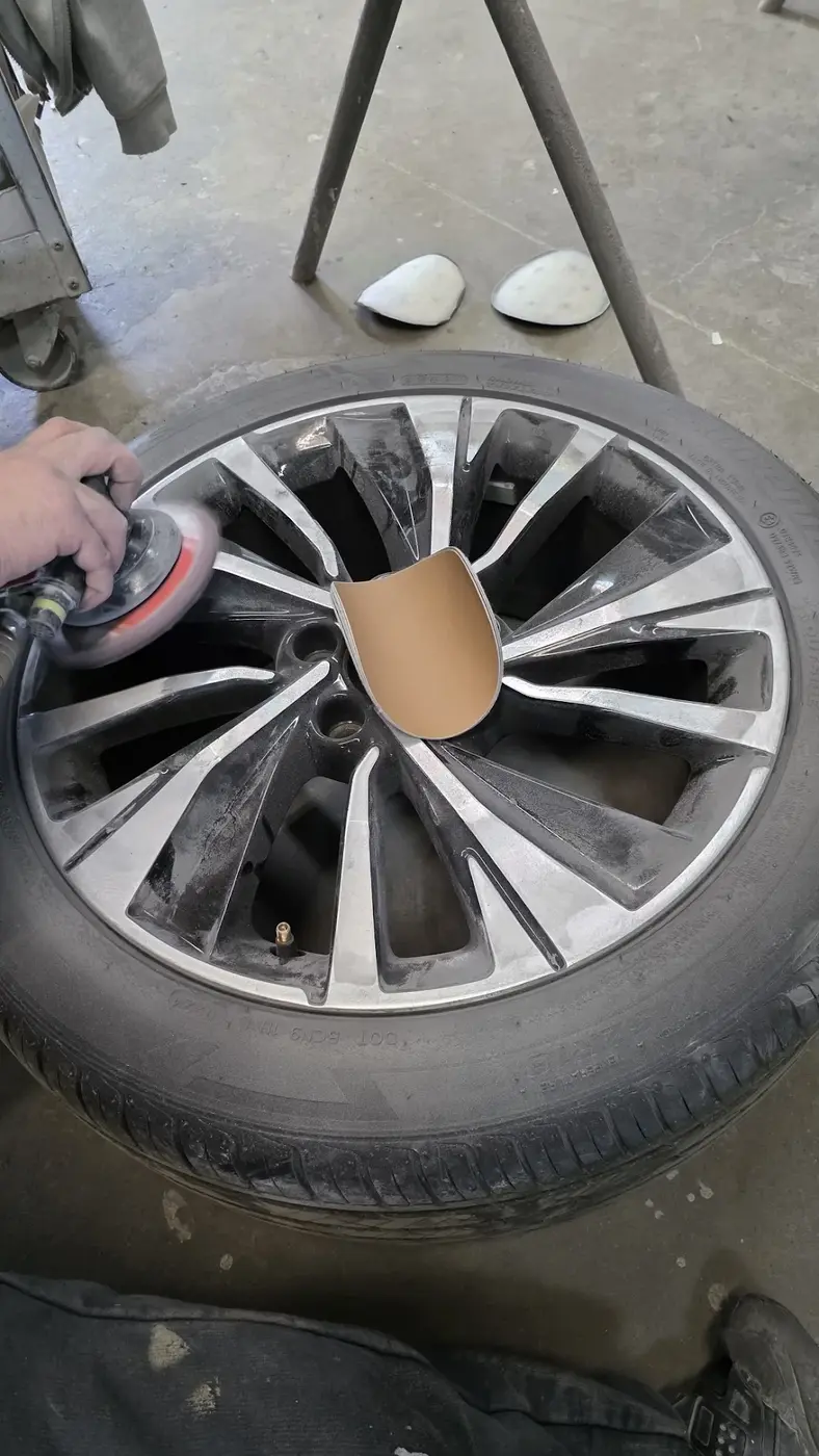 Technician performing mechanical and refinishing work at AutoStyle Collision